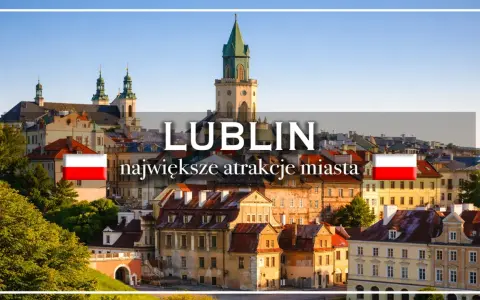 Widok na Lublin z charakterystyczną wieżą ratuszową i polską flagą.