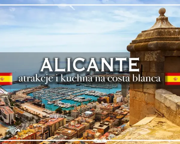 Widok na Alicante z portem pełnym łodzi, plażą i zabytkową wieżą strażniczą.